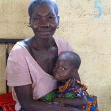 Mother in Pink w Baby-WEB Mother & baby in hospital