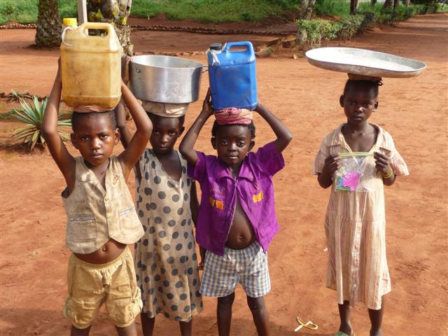 Kids carrying water